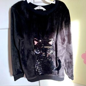 Black size 6-8 H&M cat flip sequins Sherpa sweatshirt. Practically new